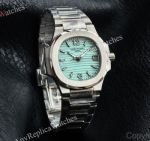 RRR Factory Patek Philippe Nautilus Cal.E 23-250SC Movement 32mm Tiffany Blue Face White Gold Bezel Women Watch
